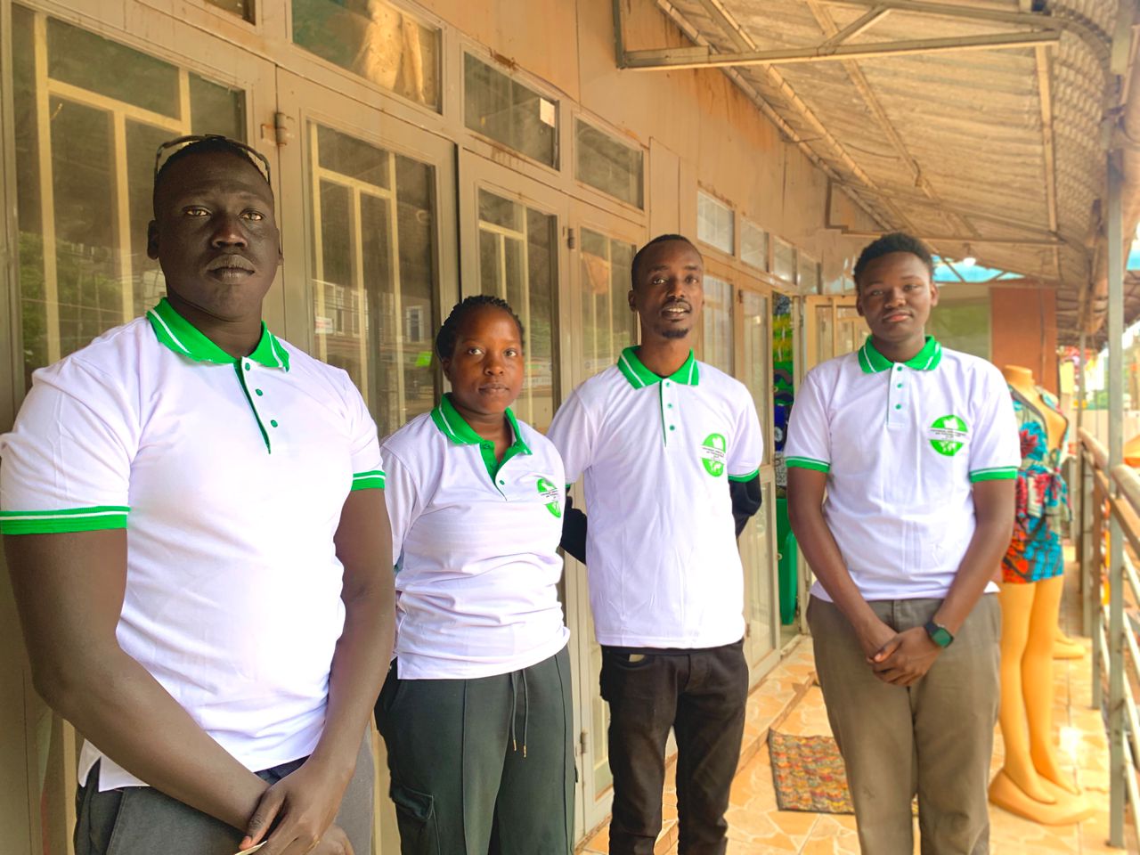 IJLAPS Kampala team standing outside the branch